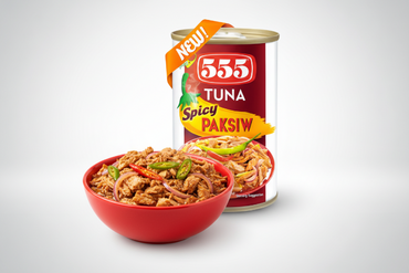 Can of 555 Tuna Spicy Paksiw with 'NEW!' label on a white background