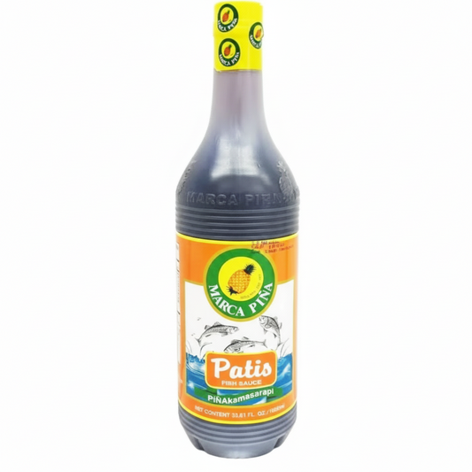 Bottle of Patis sauce with a colorful label on a white background