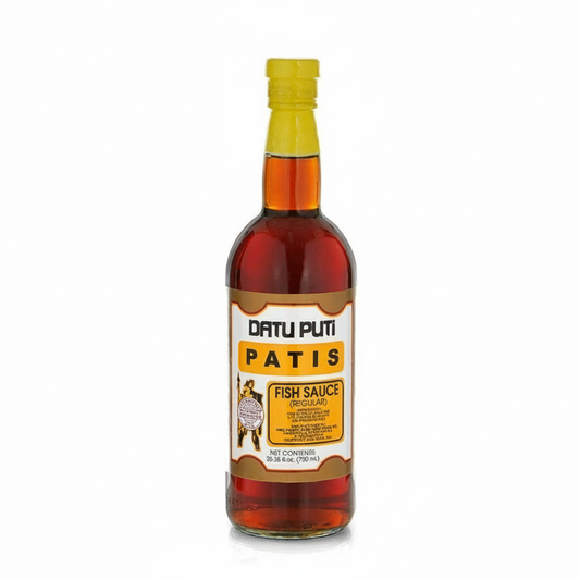 Bottle of Datu Puti Patis Fish Sauce on a white background