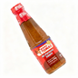 Bottle of Mang Tomas All-Purpose Sauce on a white background