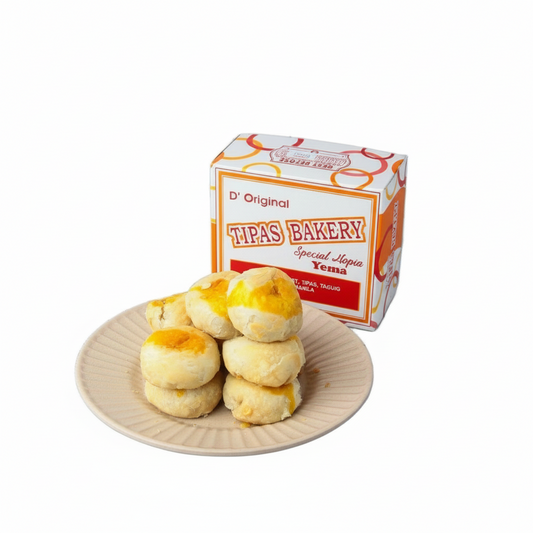 Yema cookies on a plate with Tipas Bakery packaging in the background