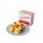 Hopia buns on a plate with a box of D'Original Titas Bakery hopia buns on a white background.