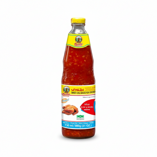 Bottle of chili sauce with a colorful label on a white background