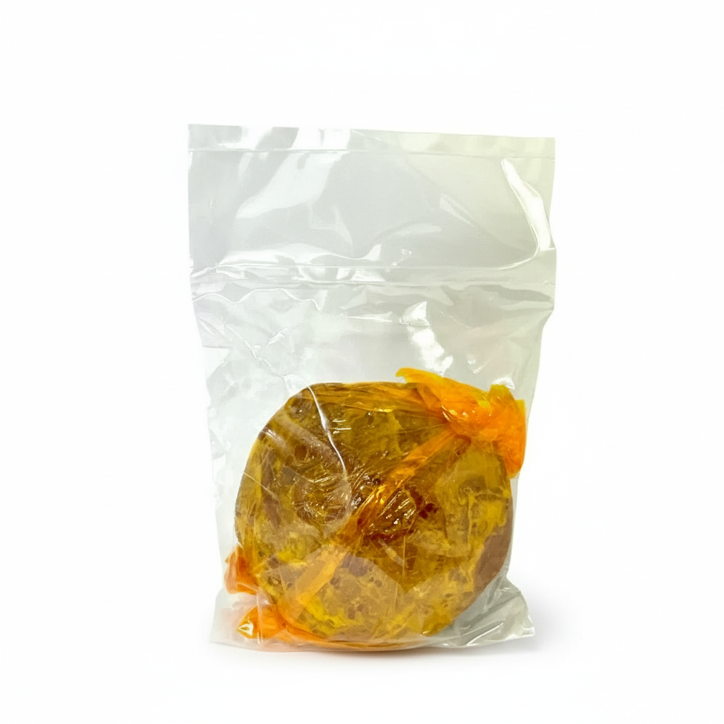 Packaged hardened brown sugar candy with a visible brand label on a white background