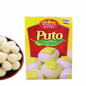 Box of White King Puto with a bowl of white pastries on a white background