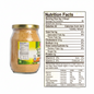 Jar of ginger juice with nutrition facts label on a white background